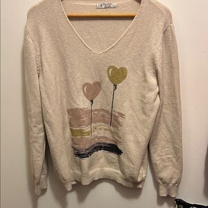 Stylish Cream V-Neck Sweater with Heart Design